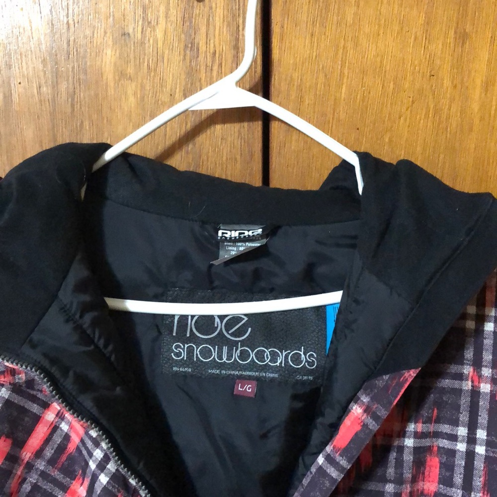 Snowboard coat, below the waist length.